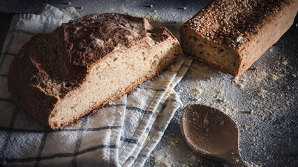 Closeup shot of freshly gluten free baked homemade sourdough bread on the table