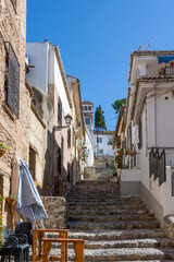 Cuesta de Abarqueros, typical narrow pedestrian street with steps in the Albaic&iacute;n neighborhood in Granada