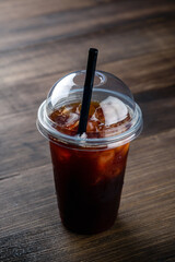 iced Cola in a plastic takeaway Cup