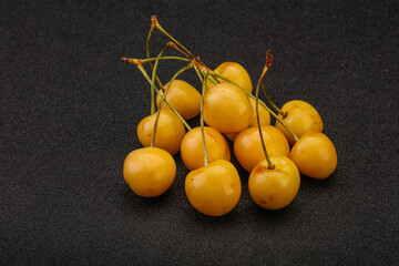 Sweet ripe yellow cherry heap