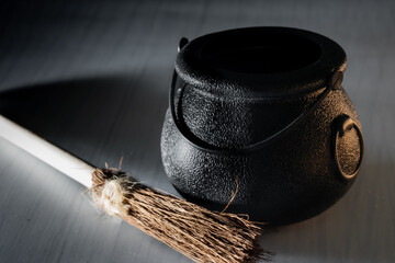 Black iron old cauldron scary prop for halloween used by witches to make brew, potions and poisons