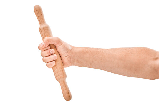 hand with wooden rolling pin isolated on white background