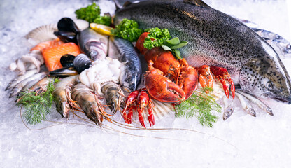 Fresh seafood on ice background, front view. - 382887128