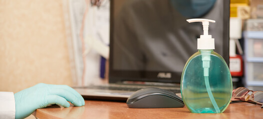 concept, there is a sanitizer near the workplace at home