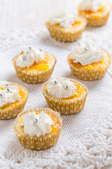 Homemade lemon curd cupcakes with whipped cream