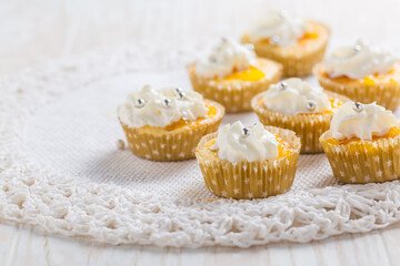 Homemade lemon curd cupcakes with whipped cream
