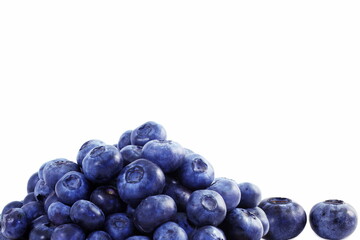 heap of blueberries on white background with copy space