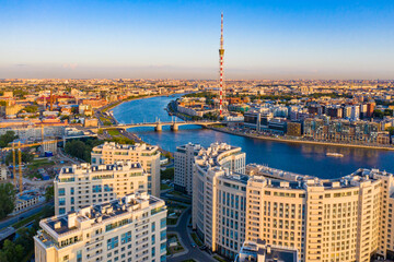 Saint Petersburg. Russia. View of the city from the drone. the Neva river in the afternoon. Rivers Of St. Petersburg. New quarters of St. Petersburg. Modern urban architecture. Urban infrastructure