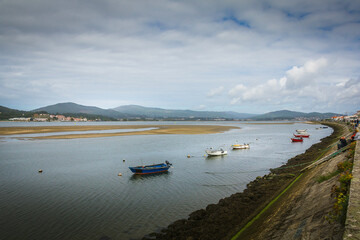 Fototapeta premium River and beach view of Caminha, Portugal with the Santa Tecra moutain in the background