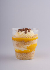 chocolate cake in a glass on a white background