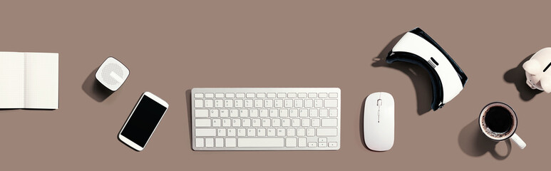 Computer keyboard with digital devices - flat lay