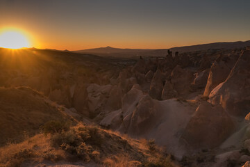 Rock Formations landscape of Goreme National Park at sunset, Cappadocia, Turkey.