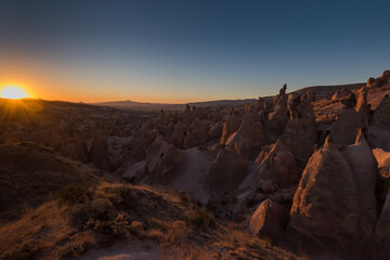 Rock Formations landscape of Goreme National Park at sunset, Cappadocia, Turkey.