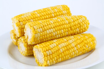 Sweet corn on a white plate