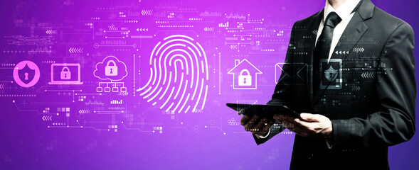 Fingerprint scanning theme with businessman using his tablet computer