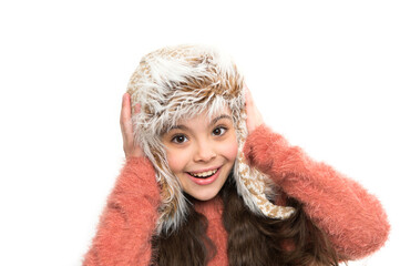 artificial fur fashion style. little playful girl in winter look smiling. Fashion concept. cute beauty isolated on white. warm in any weather. let it snow. ski resort. get ready for winter holiday