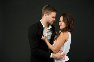 sexy couple in love. business couple represent sexual harassment. Office fashion and corporate attire. Desirable colleague. concept of partnership. man and woman embrace. love and romance
