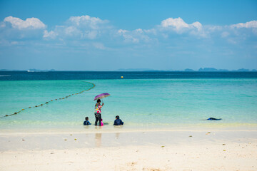 Fototapeta na wymiar Family relax on beach at Poda islandin summer, Krabi