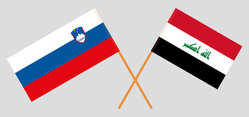 Crossed flags of Iraq and Slovenia