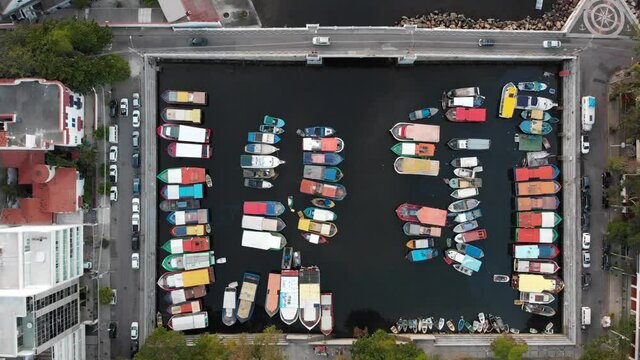 Aerial, pov, zoom out, boats anchored in Urca neighbourhood, Rio de Janeiro