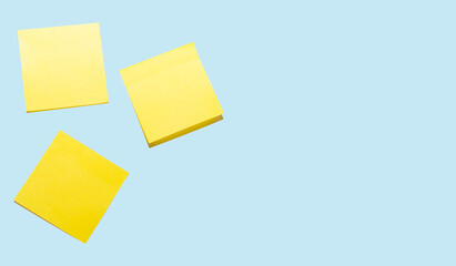 yellow stickers for entries on a turquoise background. pattern with yellow stickers for notes. space for text. isolate