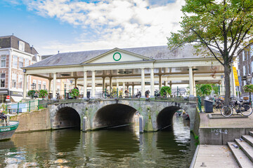 Fototapeta na wymiar Historic bridge with three bows in the centre of the city of Leiden 