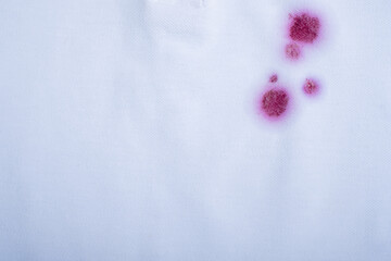 close up of a pink spot on clothes
