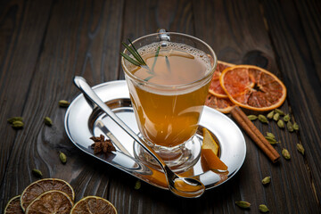 Hot mulled wine on a wooden table
