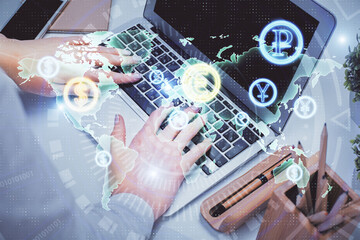 Obraz na płótnie Canvas Multi exposure of woman hands typing on computer and forex chart hologram drawing. Stock market analysis concept.