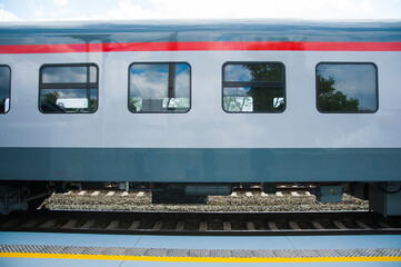 Red train in modern railway