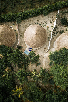 Aerial View Of Luxury Palm Cabana And Private Pool In A Tropical Island Resort Surrounded By Trees, Isla Tierra Bomba, Colombia