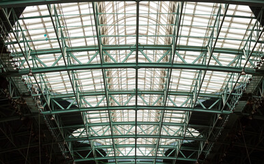 Elements of the metal structure of the roof of the exhibition complex, background