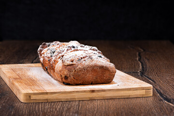 Homemade raisin pie sprinkled with powdered sugar.