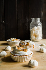 Mini lemon tarts with meringue.