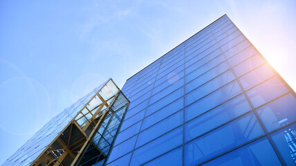 Fototapeta premium Fragment facade of a modern office building with glazing, perspective. 