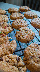 Chocolate chip oatmeal monster cookies on a cooling rack 