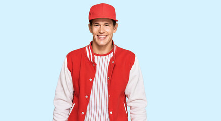 Handsome caucasian man wearing baseball uniform with a happy and cool smile on face. lucky person.