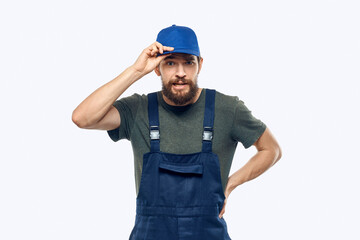 Worker man uniform delivery service emotions studio light background