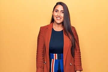 Young beautiful brunette woman wearing elegant jacket with a happy and cool smile on face. lucky person.