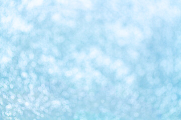 Blurred bokeh light on blue background.