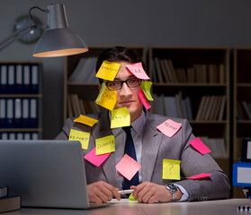 The businessman staying late to sort out priorities