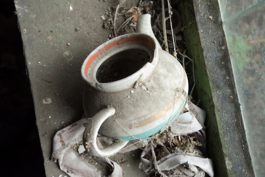 Old Dusty Broken Teapot In Chernobyl Zone