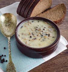 Mushroom soup served on the table