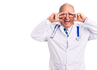 Senior handsome grey-haired man wearing doctor coat and stethoscope doing peace symbol with fingers over face, smiling cheerful showing victory