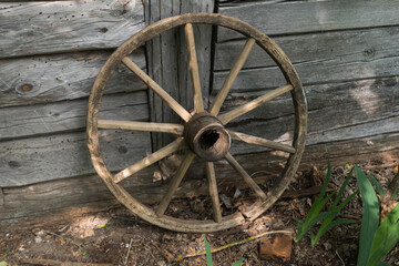Fototapeta na wymiar Old wooden wheel in Chernobyl zone