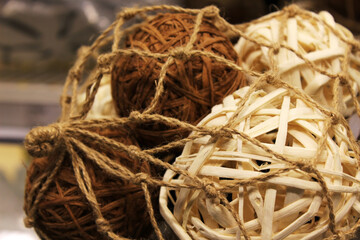 Several spherical objects woven from tree fibers
