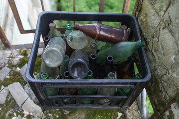 Old dusty soviet bottles in Chernobyl zone