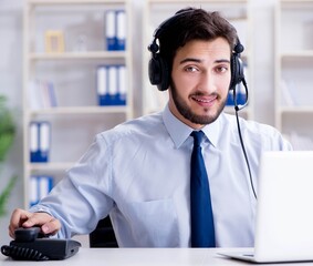 Call center employee working in office