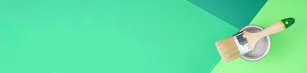 Open paint enamel cans on color palette samples. The concept of repair, construction. Shades of...