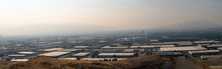 Fototapeta na wymiar City of Reno and Sparks Nevada covered by smoke and smog from wildfires in California.